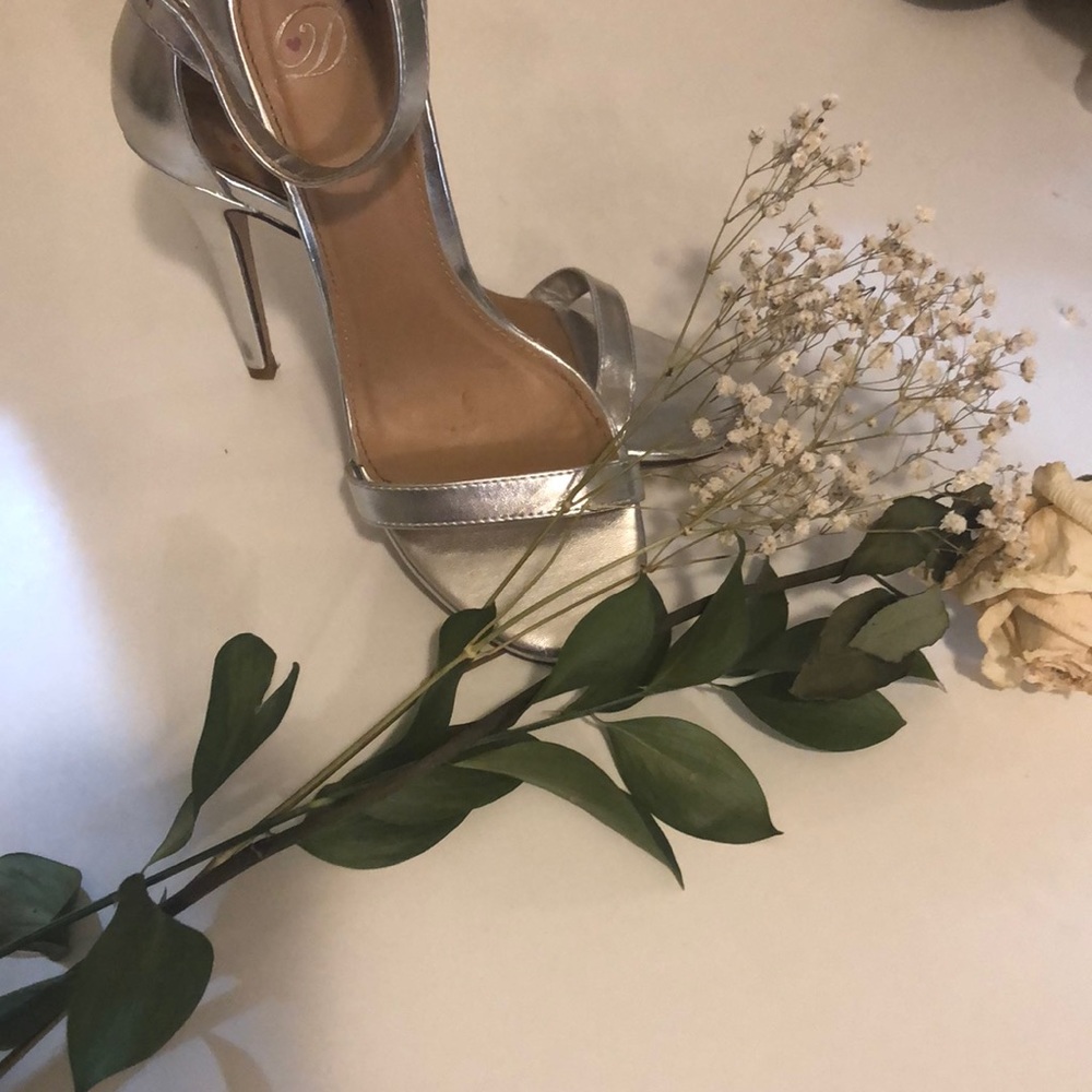 3 1/2 inch Silver stilettos!!!